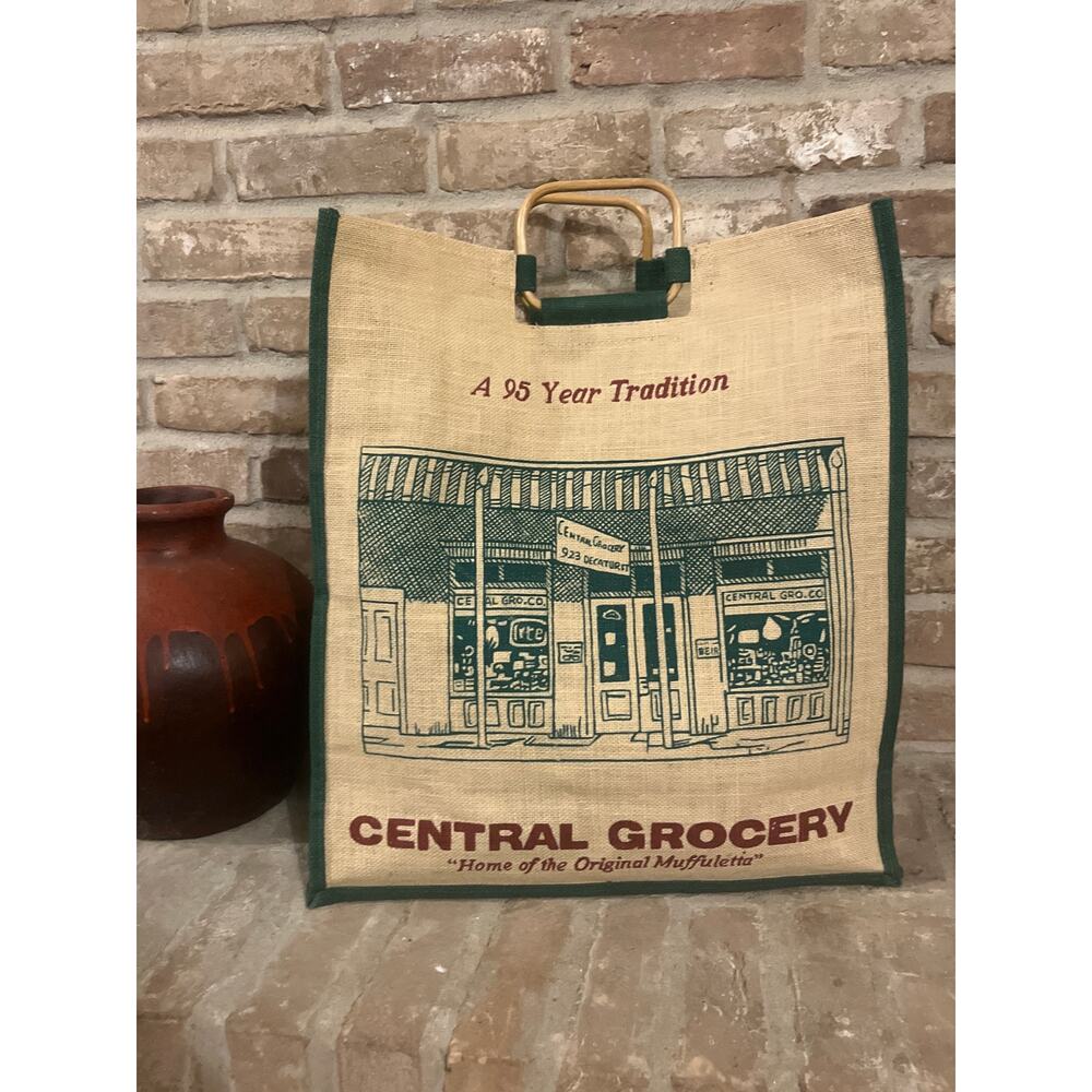 Stylish Central Grocery 100% Jute & logo on both side w/ wooden handles.